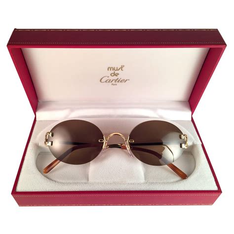 cartier round sunglasses 90s gold|cartier rimless glasses gold.